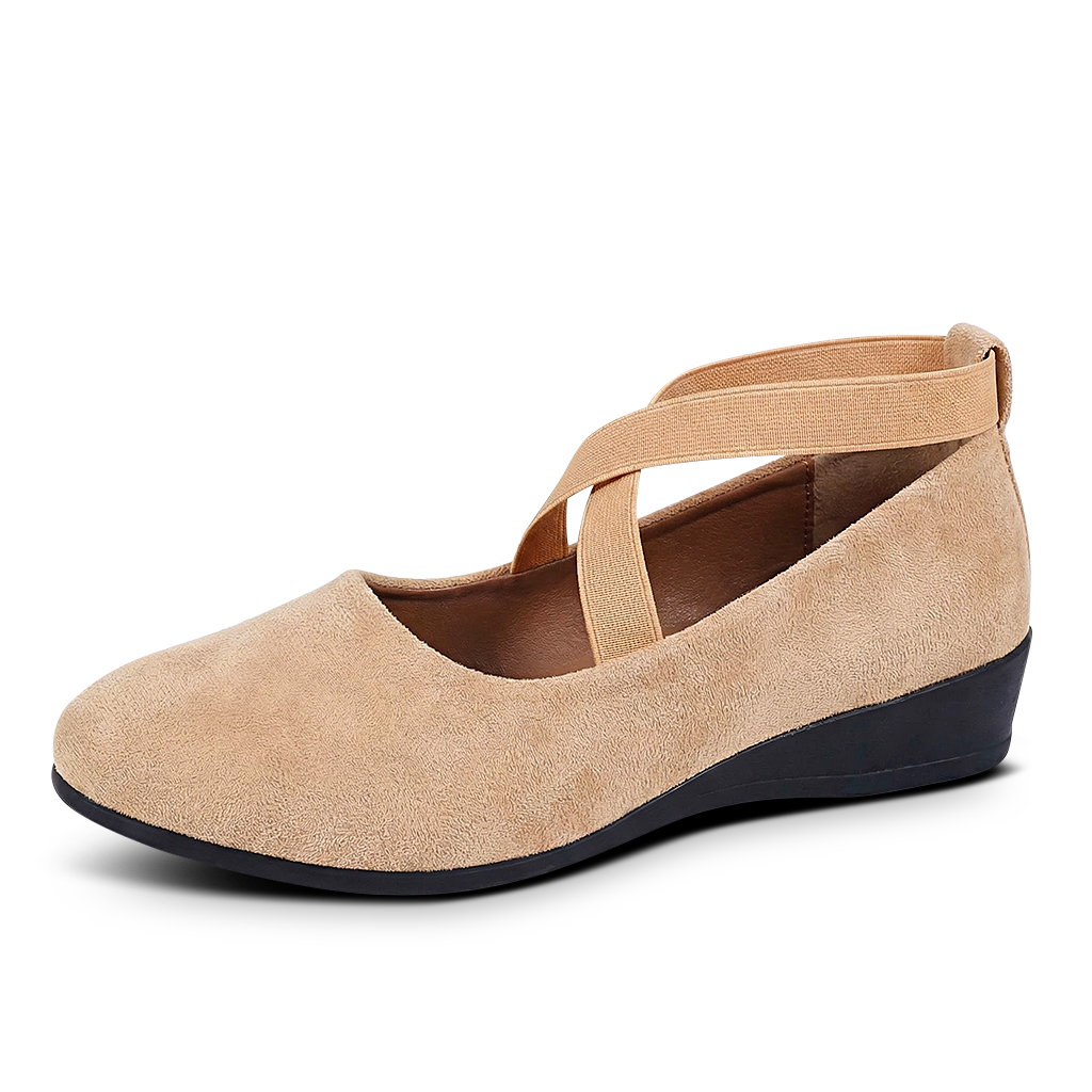 Beige shoe with a black sole on a white background