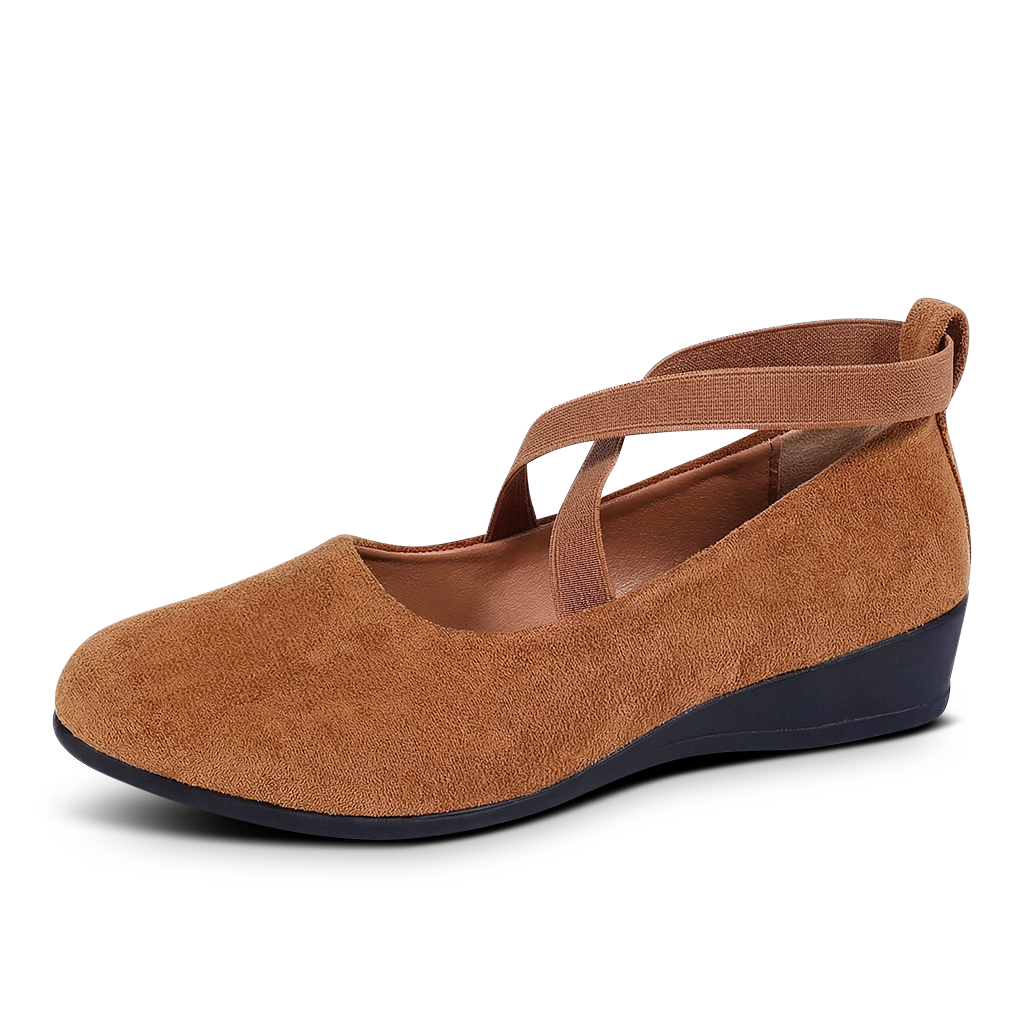 Brown wedge shoe with a strap on a white background