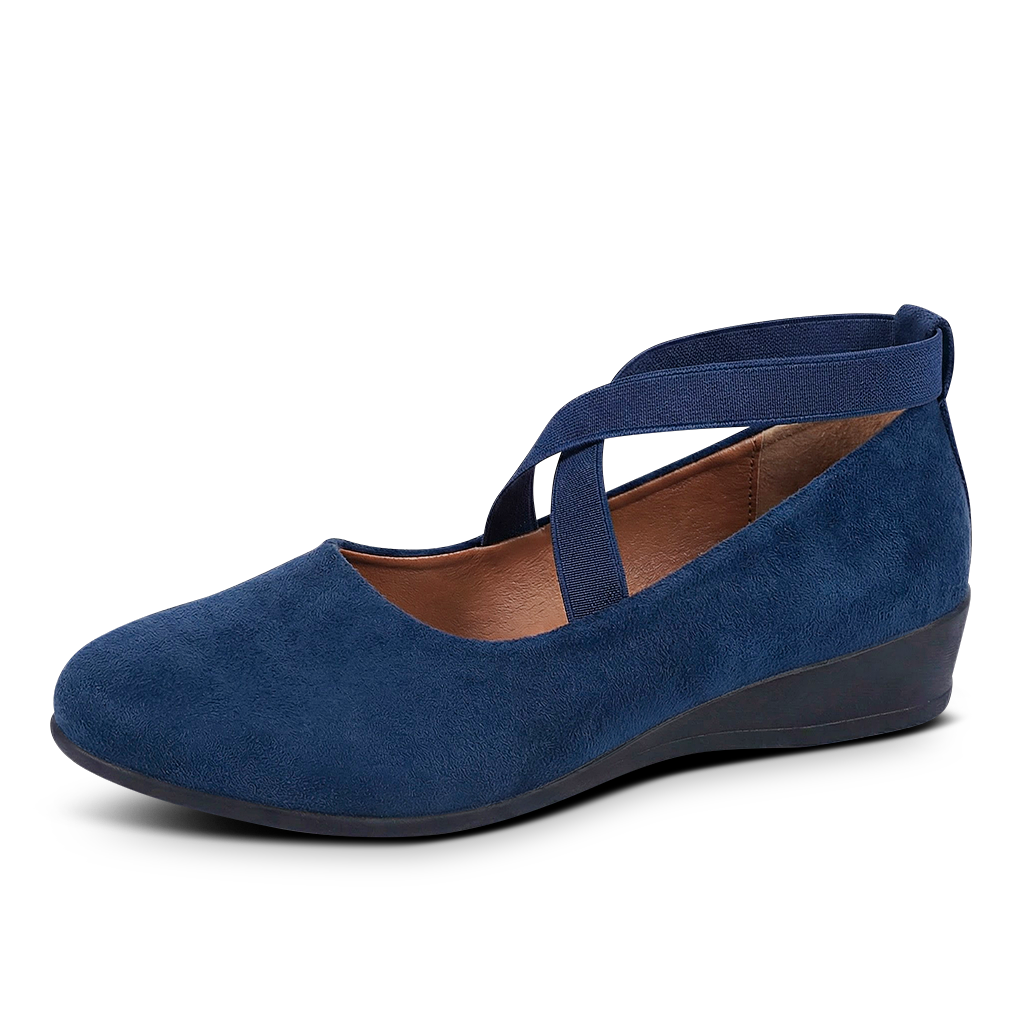 Blue wedge shoe with a strap on a white background