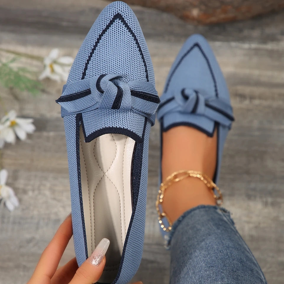 Florentine blue pointed knit flats with bow detail top view